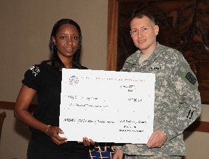 In May, Jennifer Cooper, Lester Middle School, receives the seventh annual Science, Technology, Engineering, and Math Award for $1,000 from Lt. Col. William J. Deagan, USA, chapter president.